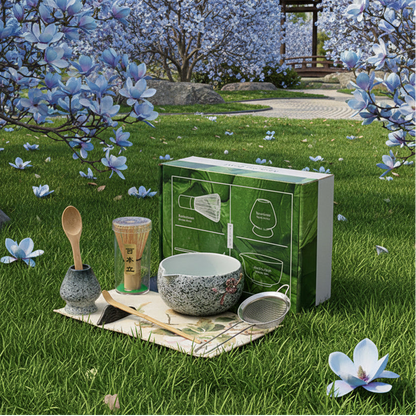 Blue magnolia matcha Tea-making set with a box on a dark surface