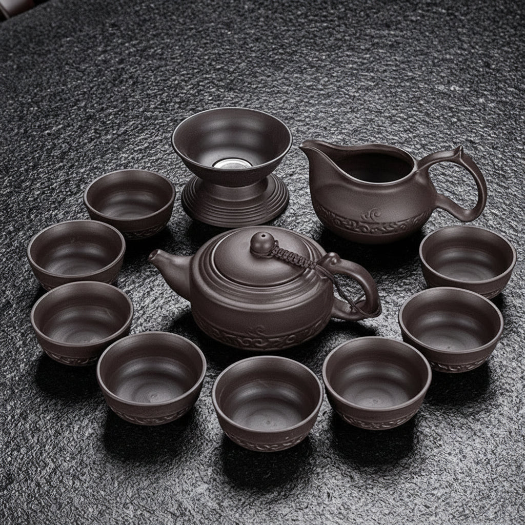11 pcs Jingde tea set on a dark textured surface